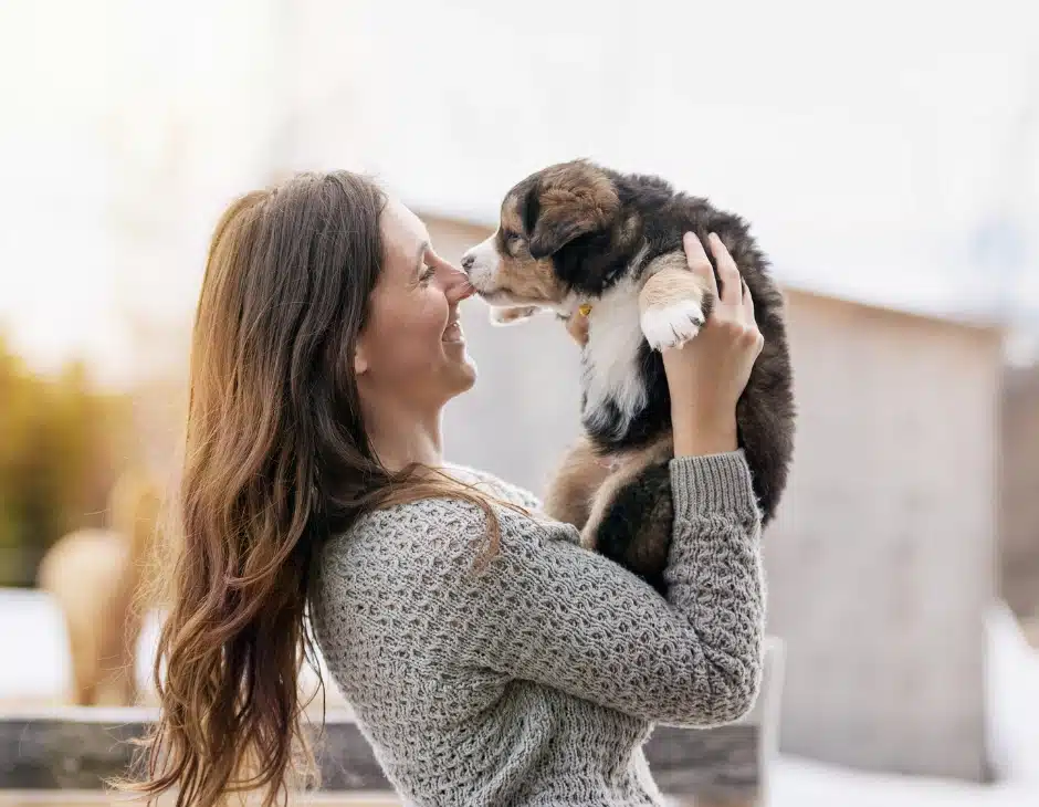 Woman with a New Puppy_ A Guide to Their First Year